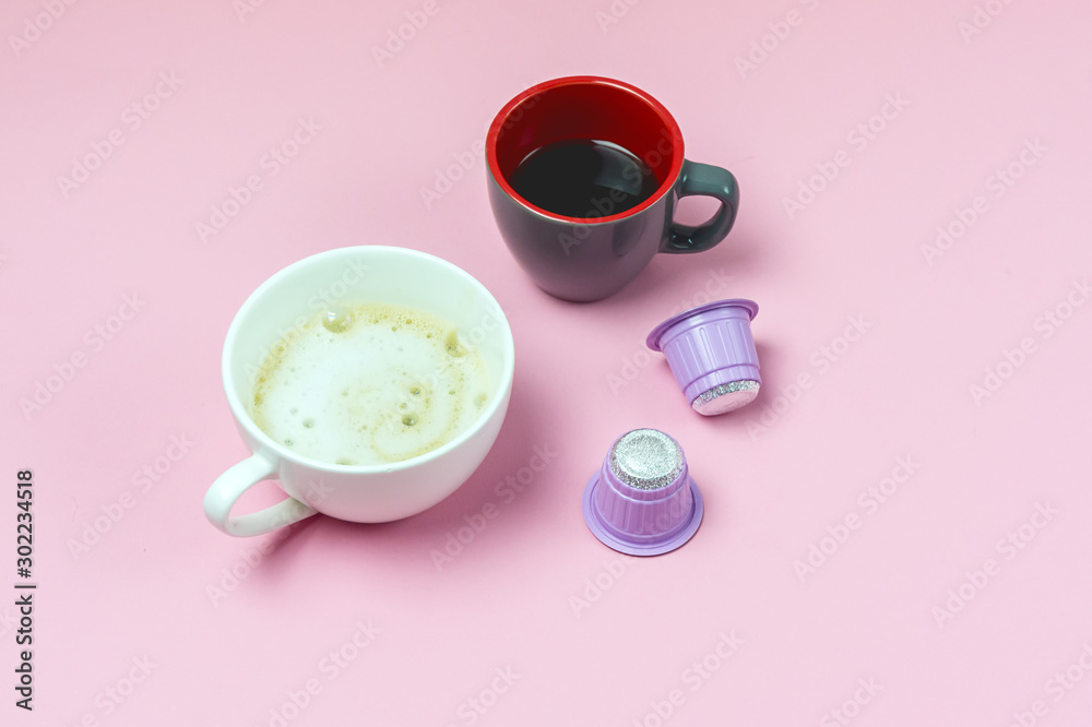 A Cup of Coffe Espresso with Coffee Capsules on a Pink Background Top View Horizontal Morning Coffee Concept A Cup of Coffe Espresso with Coffee Capsules on a Pink Background Top View Horizontal Morning Coffee Concept