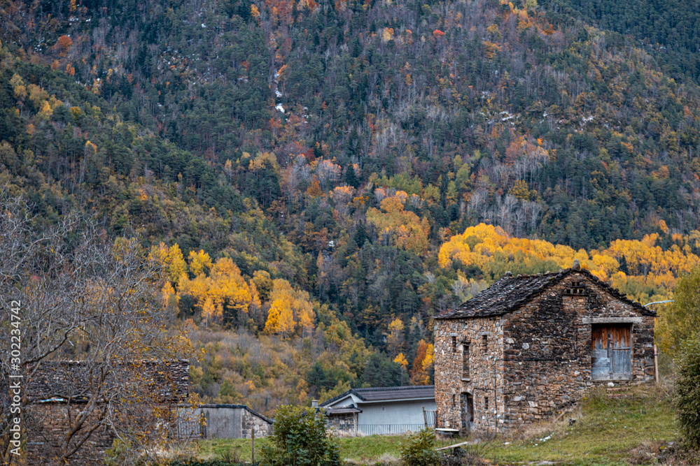 town of torla in autumn, located in pyrenees spain