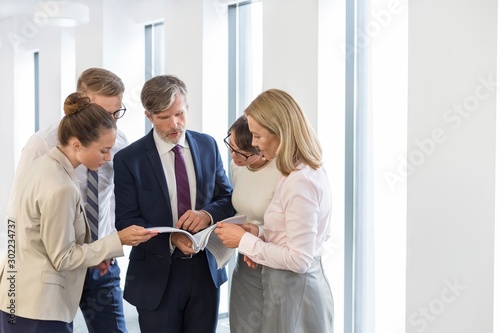 Business people on meeting in new office