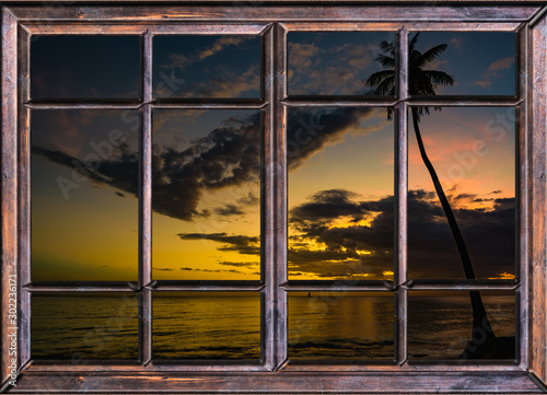 Behang view from the open window of the caribbean sunset