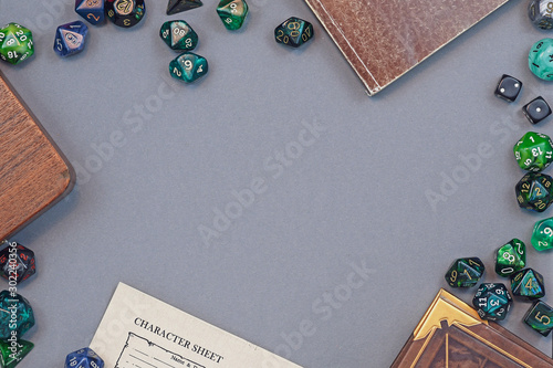 Bild auf Leinwand Flat lay concept design for tabletop role playing with colorful green and blue d