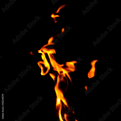 yellow fire on black background texture isolated