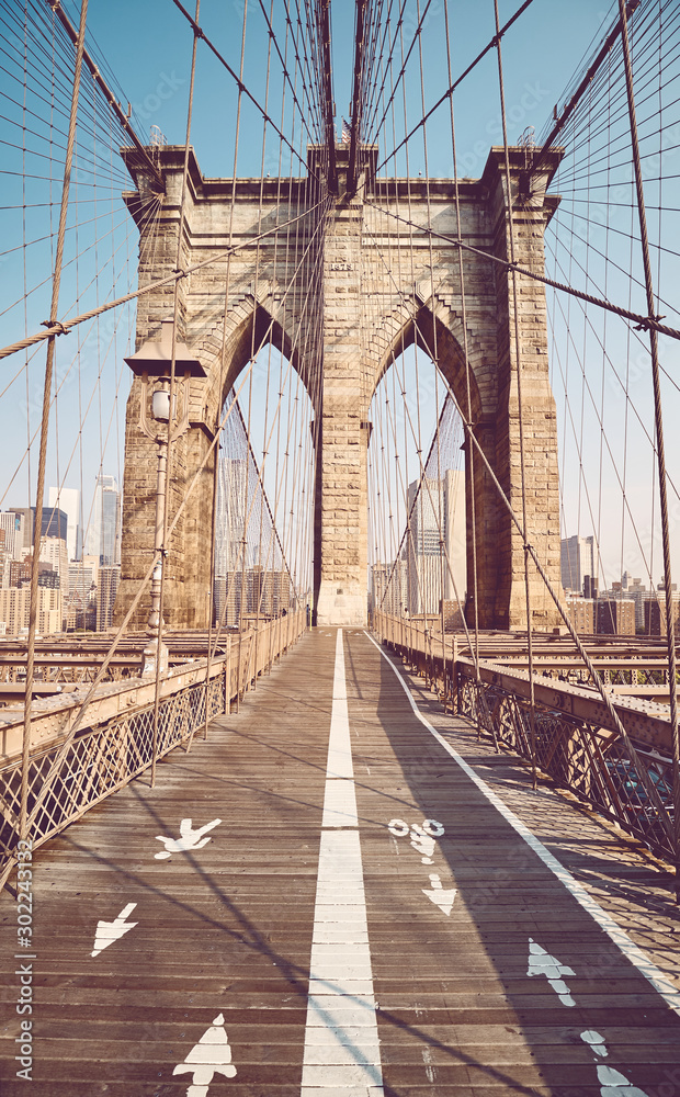Fototapeta premium Brooklyn Bridge in the morning, color toning applied, New York City, USA.