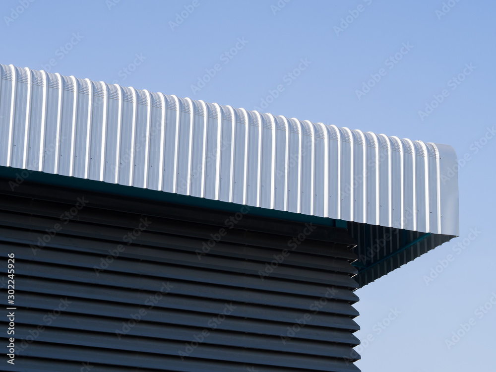 Architectural detail of metal roofing on construction Architectural detail of metal roofing on construction