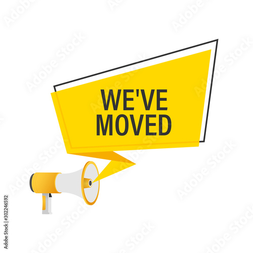 Hand holding megaphone - We have moved. Vector stock illustration.