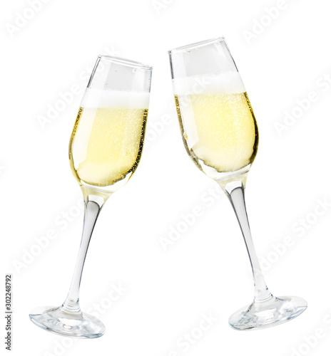 Two glasses of champagne on a white background. Isolated