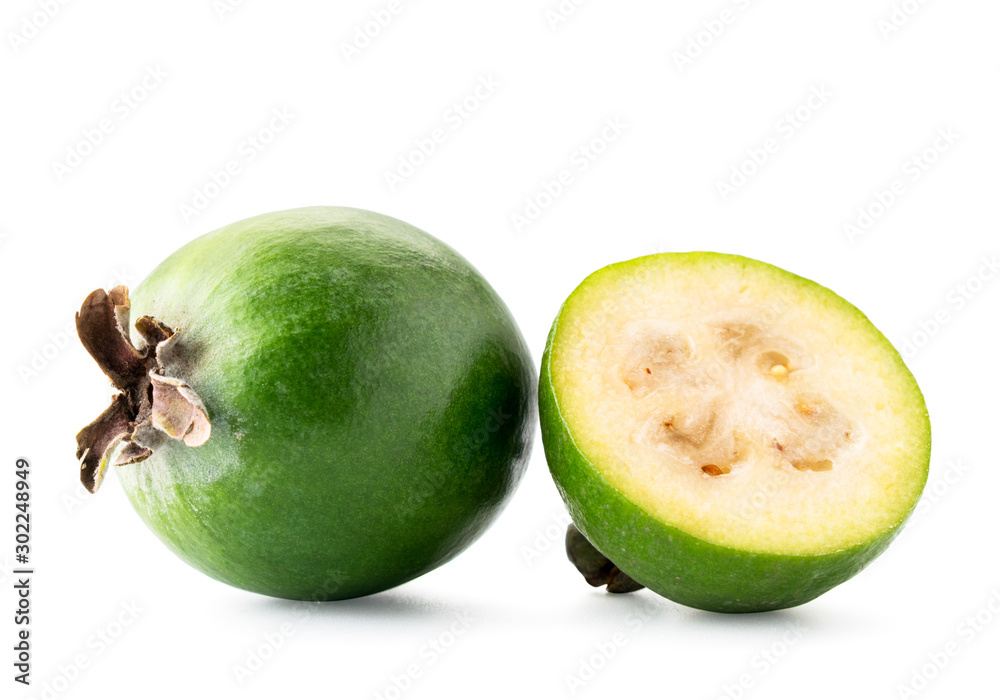 Ripe feijoa and half on a white background. Isolated.