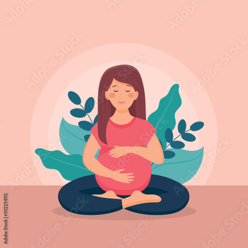 Family and medical concept. Cute pregnant woman caressing her belly.