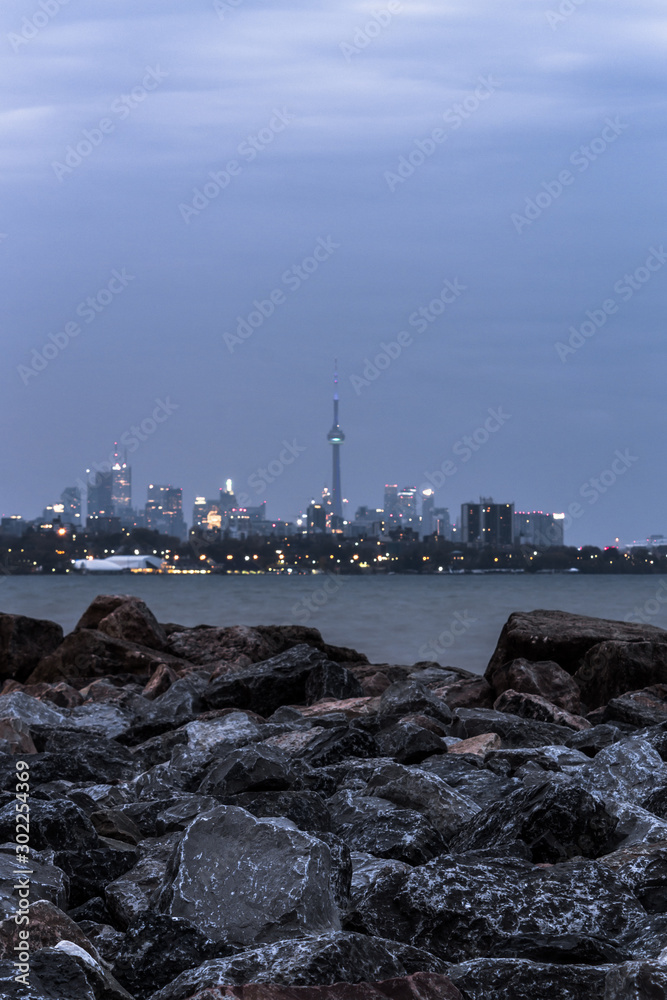 Grey morning Toronto skyline from humber bridge 