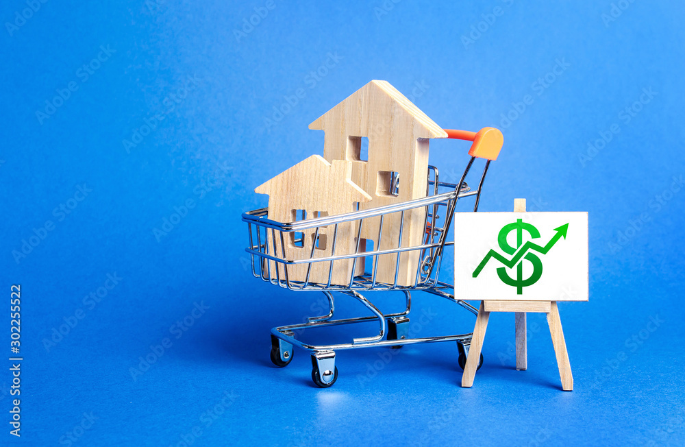 Houses in a shopping cart and an easel with a green up arrow chart. Market growth, attracting investment. Raising taxes and house maintenance. Real estate price increases. High demand and value