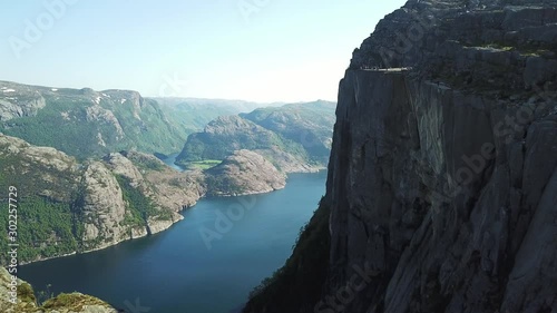 A drone flight over the Lysefjorden, in the area of Preikestolen, with the side view on the Pulpit Rock, Norway. Hiking paradise, that gives you a lot of freedom. Beautiful weather. Hikers bucket list