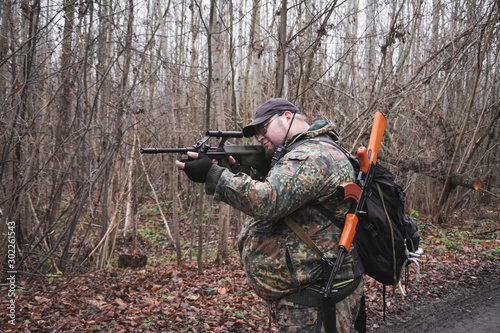 Camouflaged russian soldier during patrol