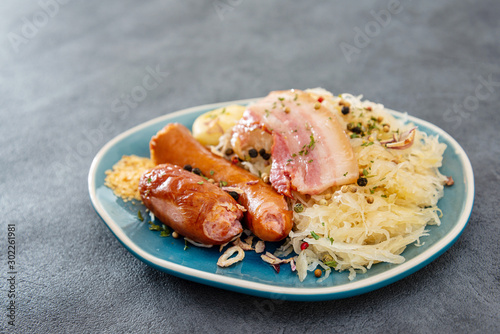 Fototapeta Naklejka Na Ścianę i Meble -  Central and Eastern European cuisines choucroute - sauerkraut with riesling