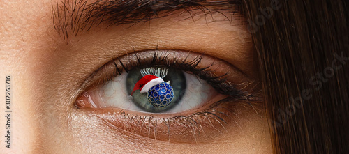 close up of evil female eyes christmas eye