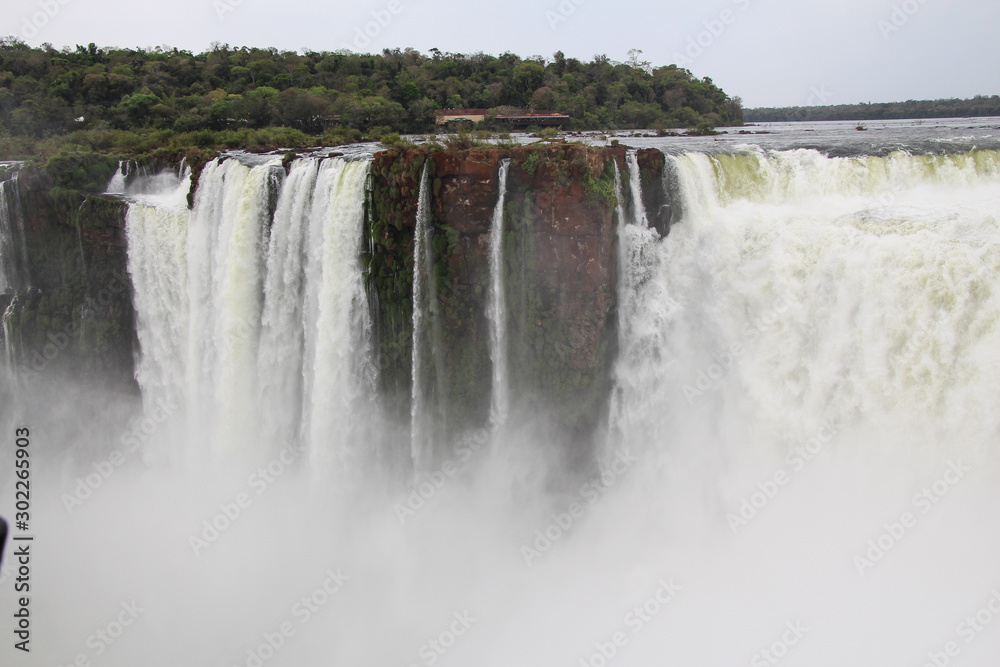 Magnificent Iguazu Falls on the border between Argentina and Brazil Magnificent Iguazu Falls on the border between Argentina and Brazil