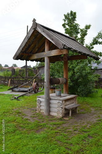 Old water well in the village. Equipment for groundwater. © Elenapro