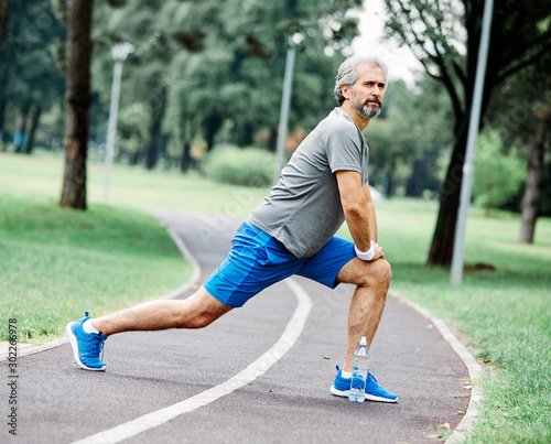 senior man running exercising sport fitness active fit