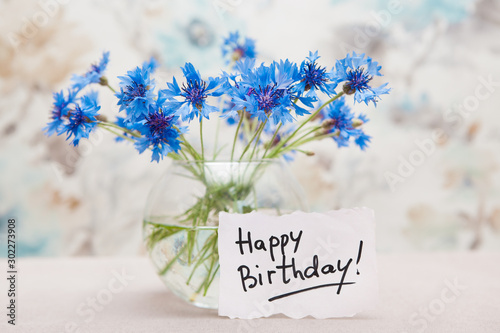 Canvas Print Happy birthday card with bouquet of blue cornflower flowers