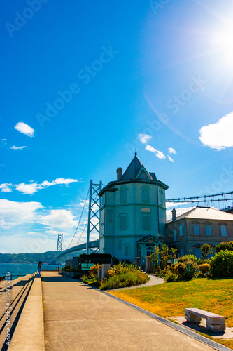 Akashi Kaikyo Bridge and Sun Yat-sen Memorial Hall (Ijokaku). Tarumi-ku, Kobe City, Hyogo Prefecture, Japan photo