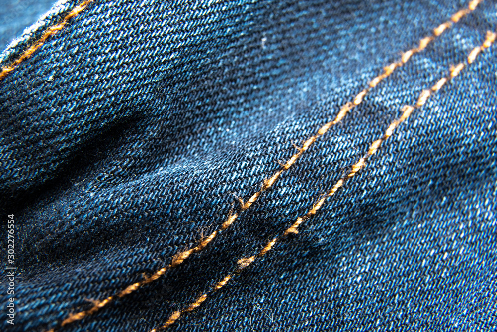 Blue jeans fabric macro seam pattern background / Denim jeans texture /  Blue jeans texture for any background. foto de Stock | Adobe Stock