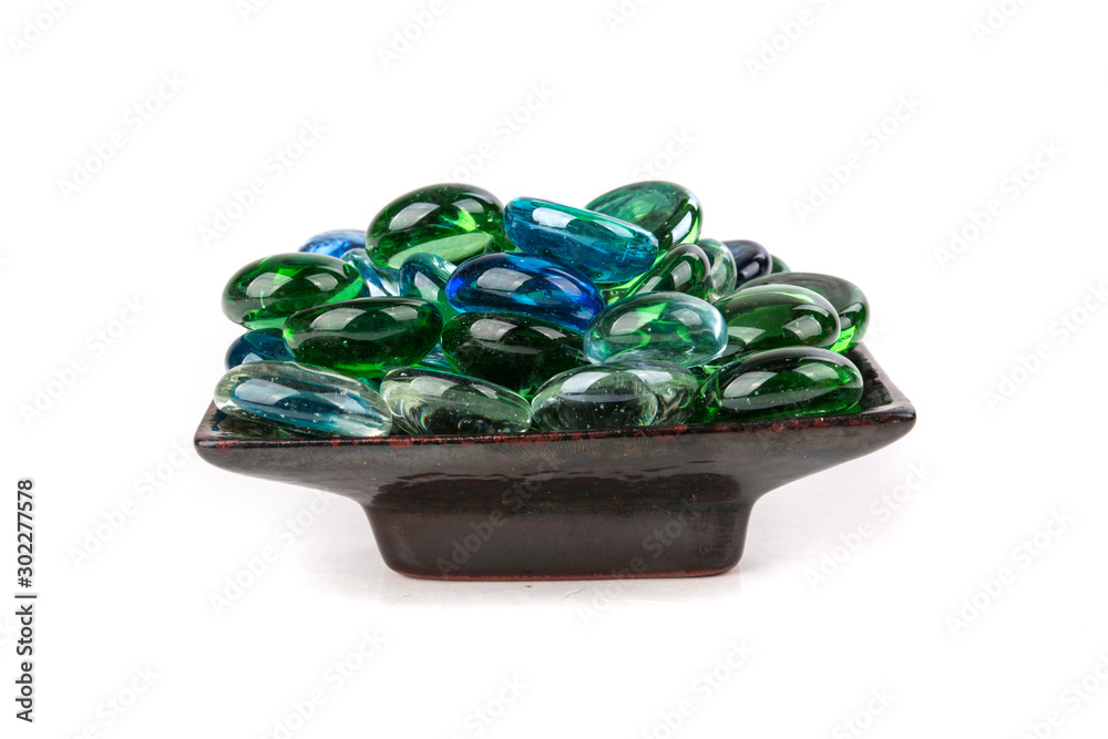 Pile of green clear white blue glass pebbles Pile of green clear white blue glass pebbles