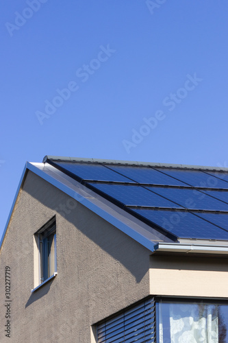 solar panel on a rooftop of a modern house