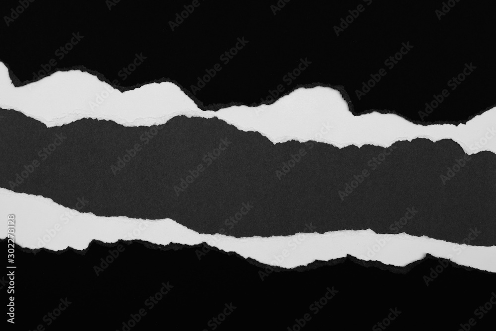 Ripped paper on grey Ripped paper on grey