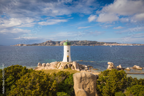 Italy, Sardinia, Sassari Province, Palau, Porto Faro Lighthouse with La Maddalena island
in distance photo