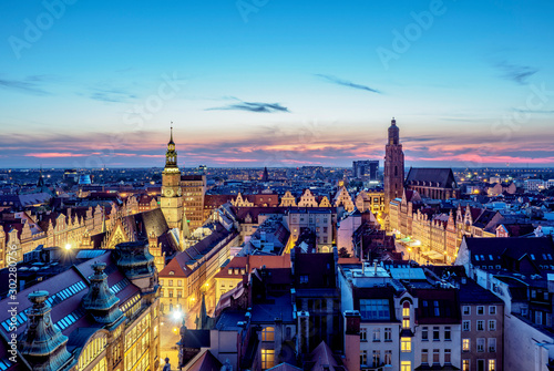 Skyline with Old Town Hall and St. Elizabeth Church at dusk, elevated view, Wroclaw, Lower Silesian Voivodeship, Poland photo