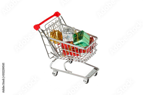 Shopping cart loaded with gifts © Roland Magnusson