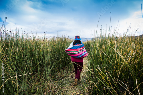 Peruvian lady titicaca photo