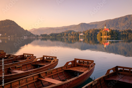 Lake Bled with boats at autumn background. Lake bled is famous place and popular European travel destination.