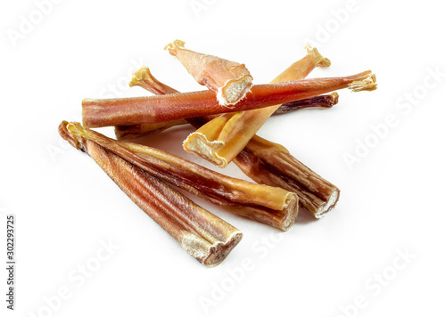 a group of natural dog teeth cleaning bully sticks on white background