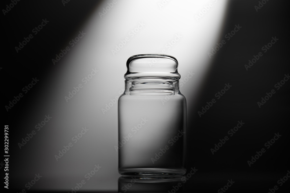 Empty glass jar on a white background Empty glass jar on a white background