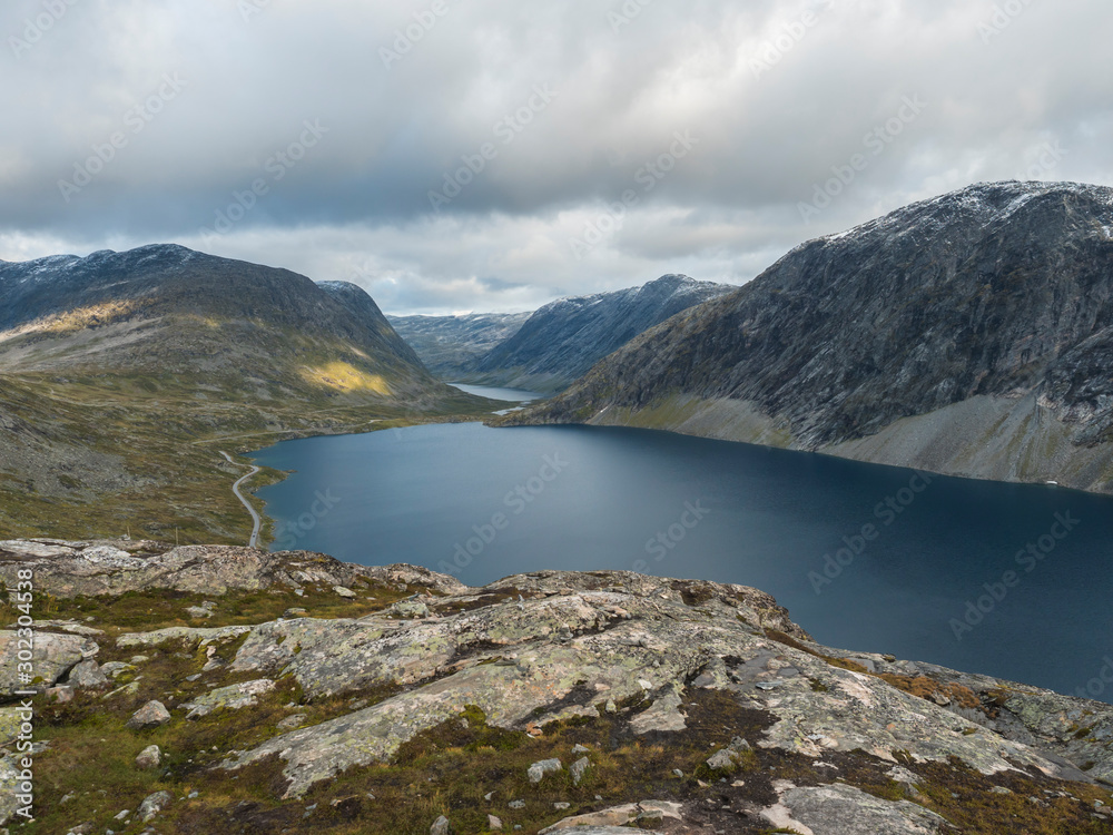 View of the Lake Djupvatnet from raod to mountain Dalsnibba plateaua. Norway, early autumn, cloudy day. Travel Holiday in Norway