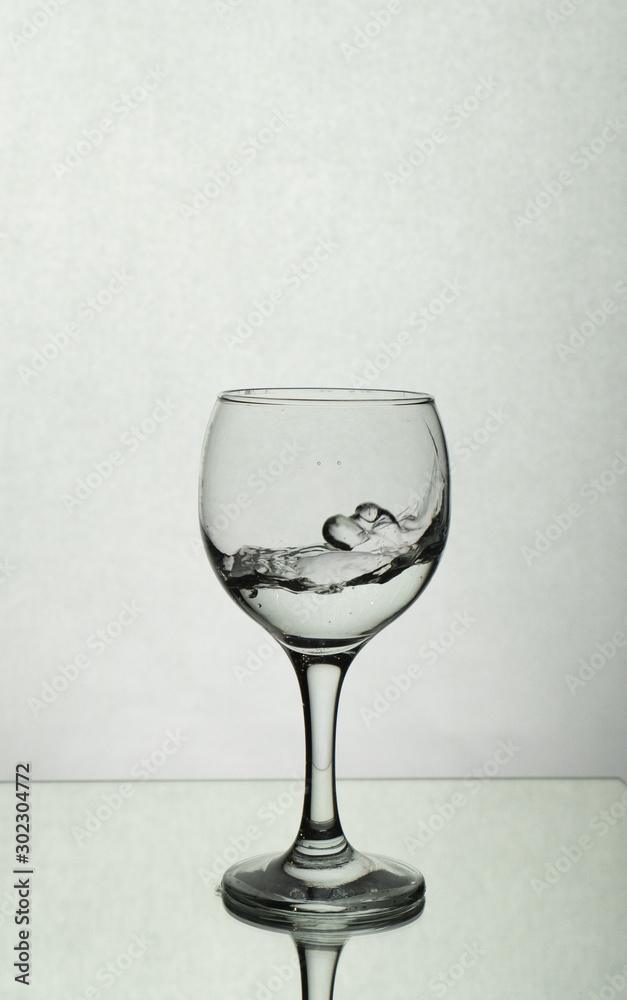 Splash of water in a wine glass Splash of water in a wine glass