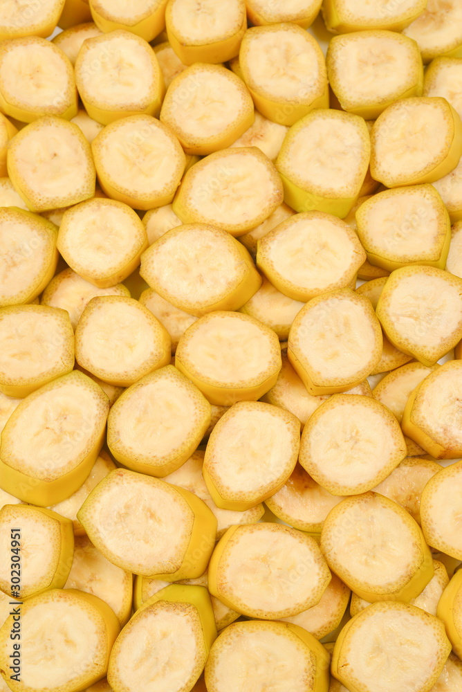 Fresh banana slices background. Top view. Fresh banana slices background. Top view.