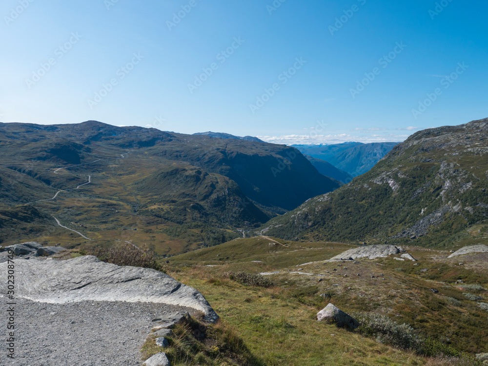 View on mountain landscape in summertime with snowy peaks and glaciers. National tourist scenic route road 55 Sognefjellet between Lom and Luster, Norway.