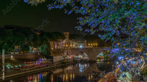 Views of Rome by night with blue led light trees