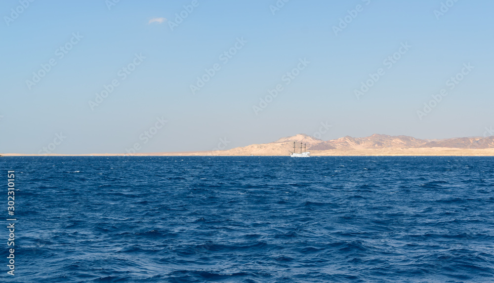 Obraz premium Sharm el Sheikh is a resort city in Egypt at the southern tip of the Sinai Peninsula on the Red Sea coast of the Egyptian Riviera. Boat trip to the coral reefs of Tiran island.