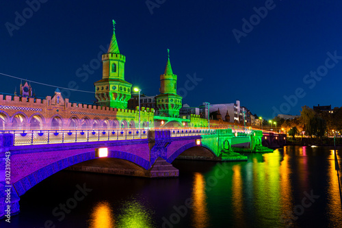 Oberbaum Bridge between Friedrichshain and Kreuzberg in Berlin at night, Germany