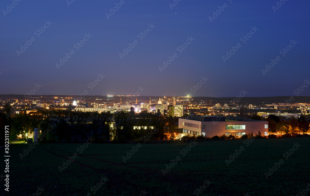 Dresden, Germany by night, panorama view from a hill to the center of the town