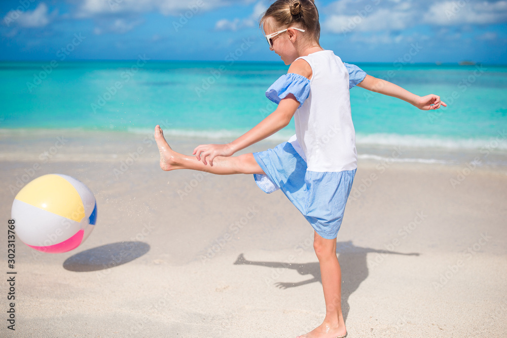 Young beautiful girl having fun on tropical seashore. Young beautiful girl having fun on tropical seashore.