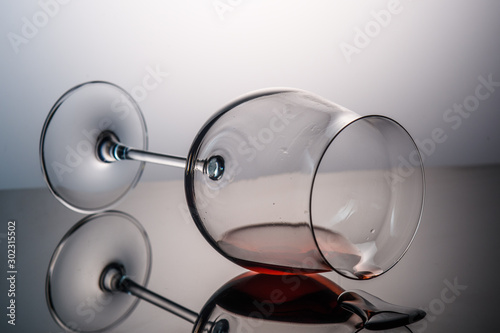  thrown glass of red wine and wine drops © Михаил Шорохов