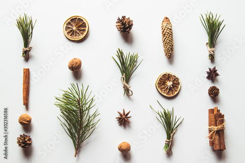 Winter flat lay style picture. Natural christmas pattern made of fir branches