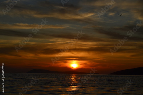  sea  sunset  island sky clouds