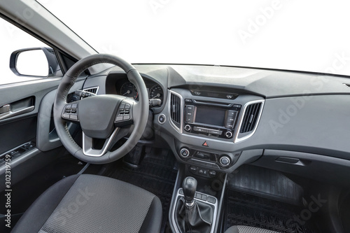 panorama in interior leather salon of prestige modern car. steering wheel, shift lever and dashboard