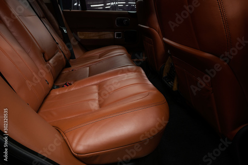 Leather seats in modern car. Interior detail.