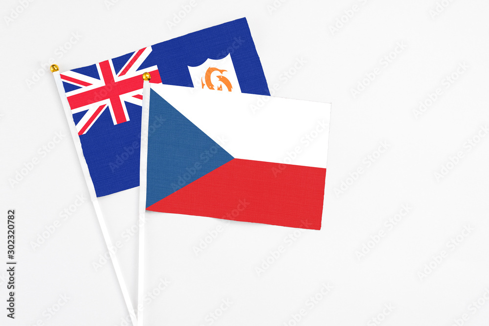 Czech Republic and Anguilla stick flags on white background. High quality fabric, miniature national flag. Peaceful global concept.White floor for copy space. Czech Republic and Anguilla stick flags on white background. High quality fabric, miniature national flag. Peaceful global concept.White floor for copy space.