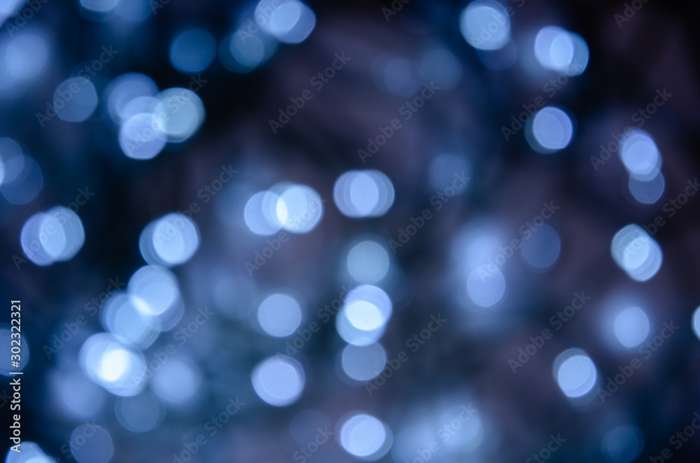 Abstract pattern of bokeh garland lights on a dark background Abstract pattern of bokeh garland lights on a dark background